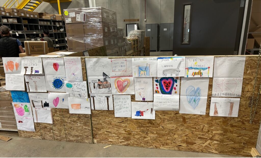 Thank you notes and pictures from Northern Michigan students are displayed for co-op linemen and crew members working on power restoration efforts.